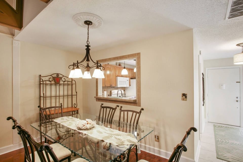 The dining table comfortably seats 6 people.