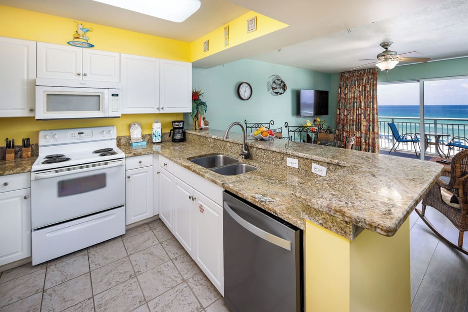 Kitchen - The condo has a fully equipped kitchen with plenty of counter space.