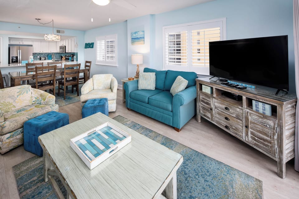 Living Room View - Living Room: Bright, beachy vibes with fun seating and a view for perfect gatherings!