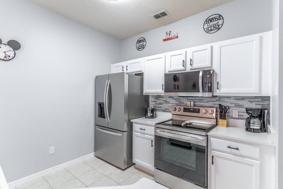 Fully stocked kitchen with Stainless steel appliances