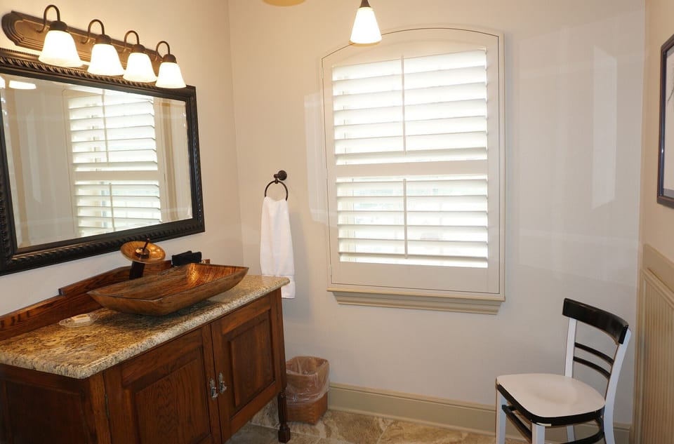 Ensuite bathroom with updated fixtures.