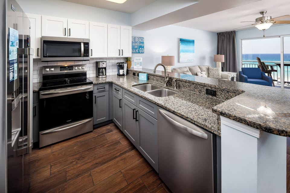 Kitchen - Brushed nickel hardware and newer cabinet paint make the kitchen in 510 unbeatable.