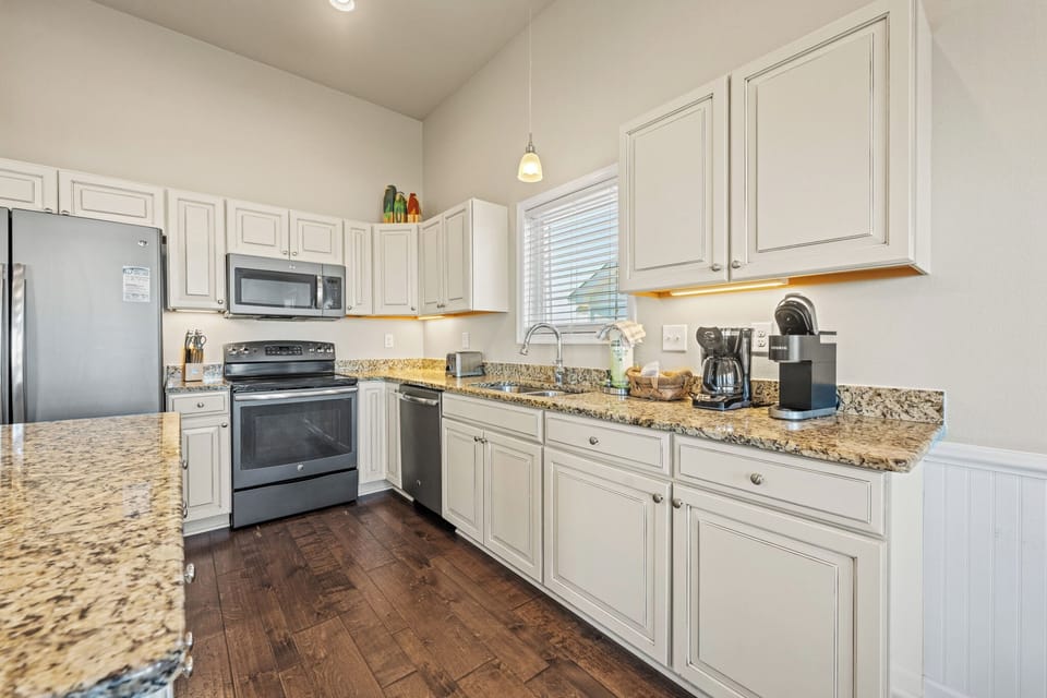 Large Kitchen with Bar Seating on the Third Level