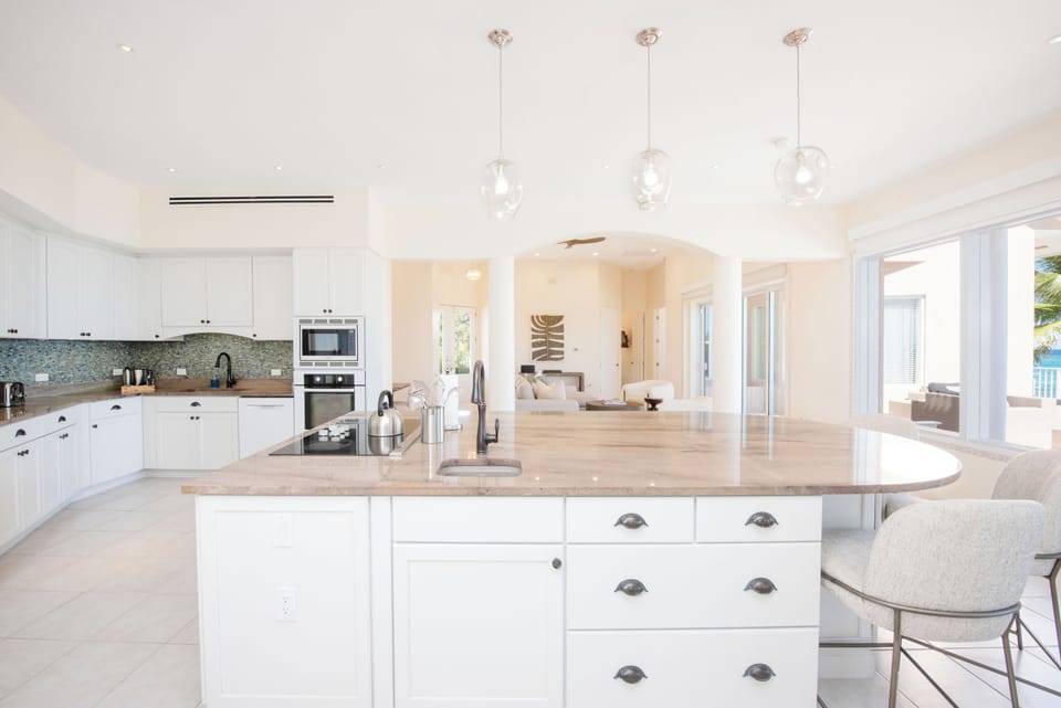 Full kitchen with modern appliances. Cookware, flatware, glassware, and utensils are all provided. 