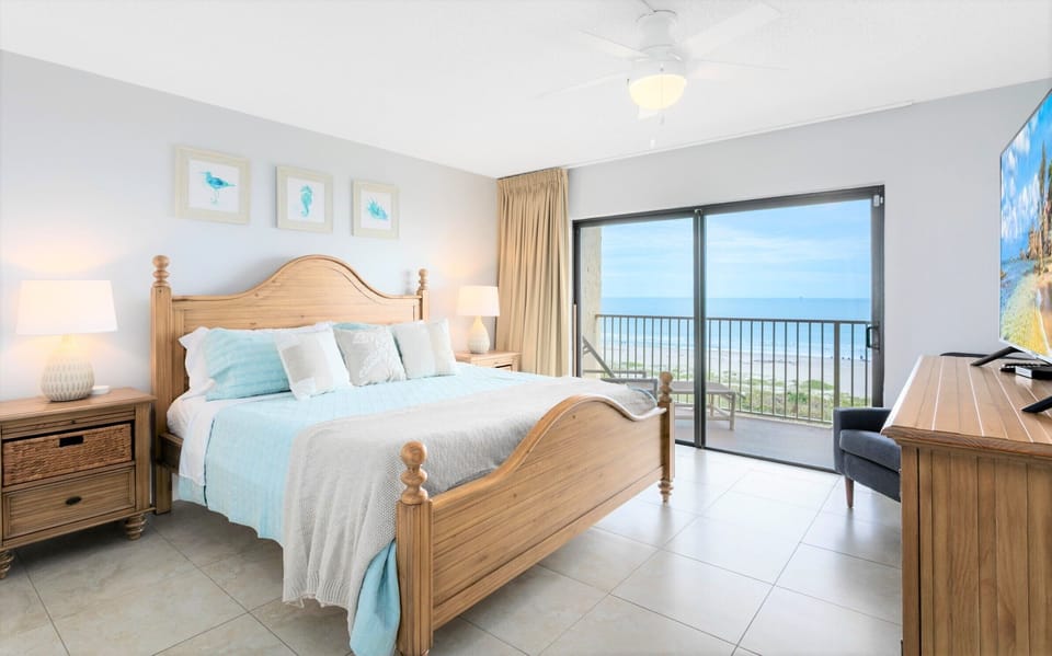 Master bedroom with ocean views and cozy plush king bed
