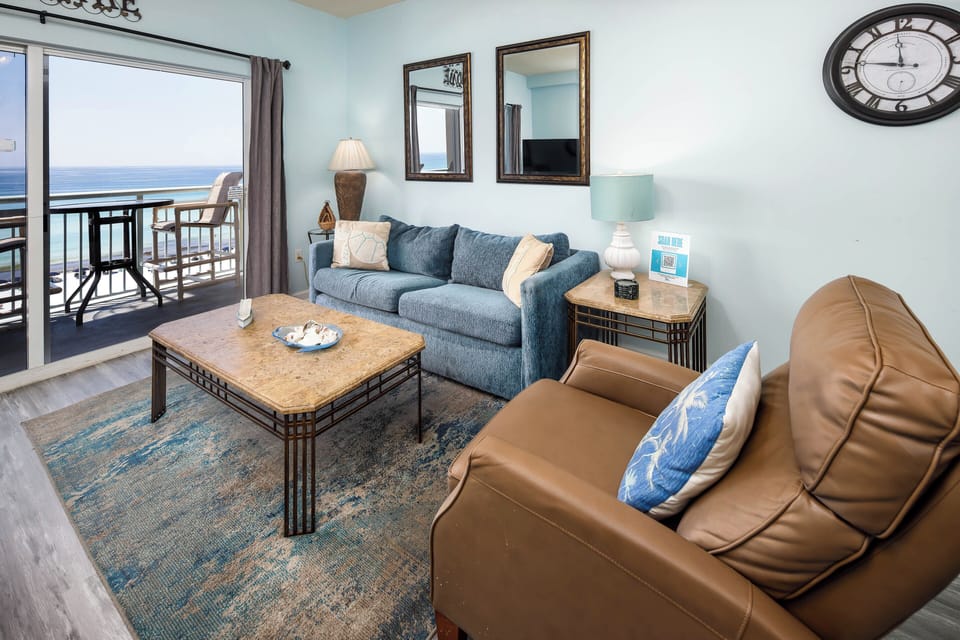 Living Area - This 6th floor beach front living room has a sleeper sofa, recliner and a large  flat screen TV with TV stand. The view is Beautiful!