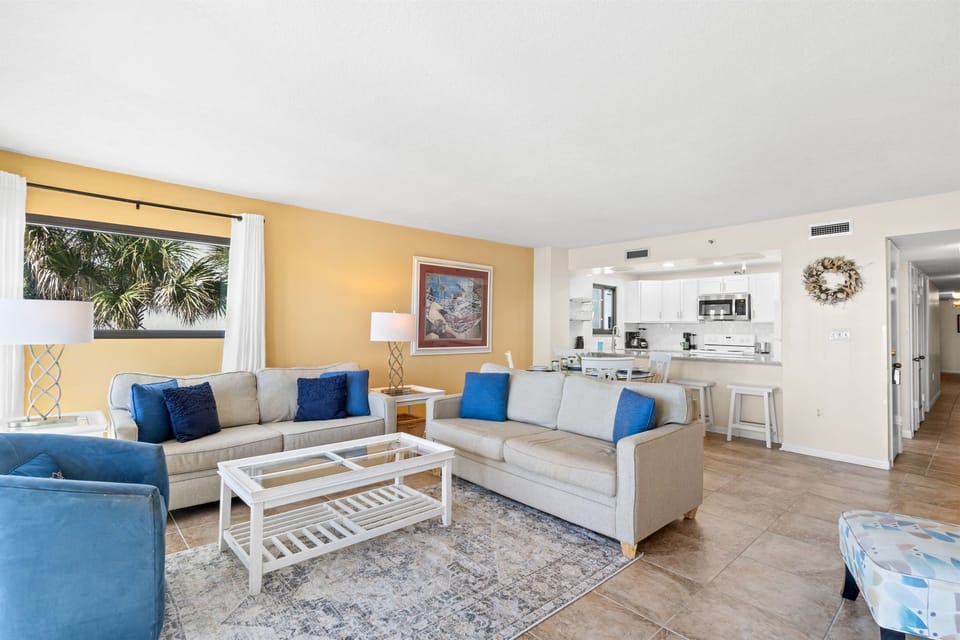 Living Room - Just steps away from your private balcony!