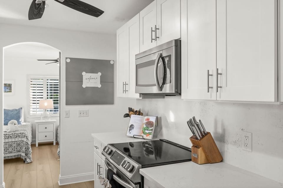 Cook with ease in the updated kitchen featuring modern appliances and generous counter space.