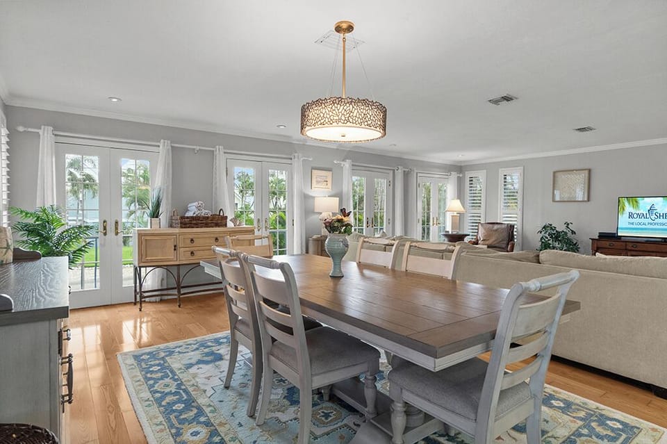 Beach-inspired dining space with seating for six—ideal for gathering around fresh seafood feasts or laid-back breakfasts.