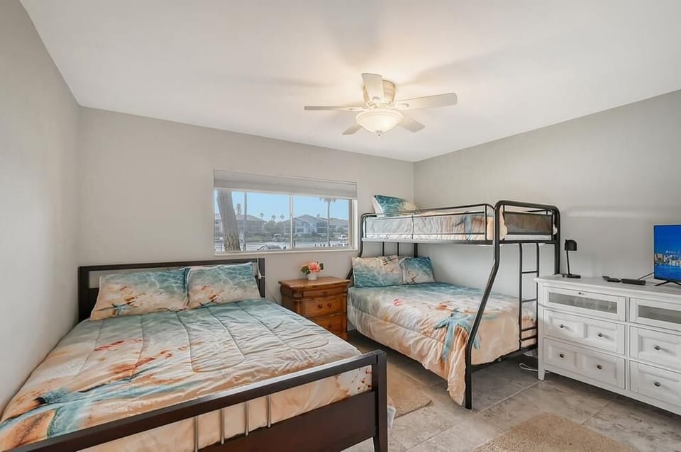 Guest bedroom with flat screen TV