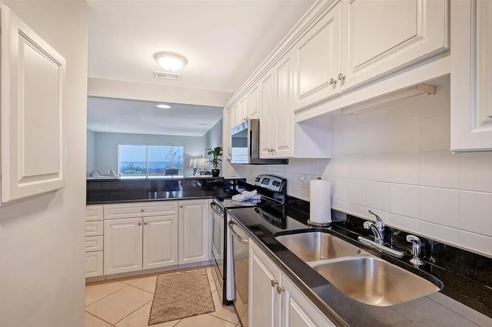 Kitchen with newly refurbished cabinets and Gulf View!