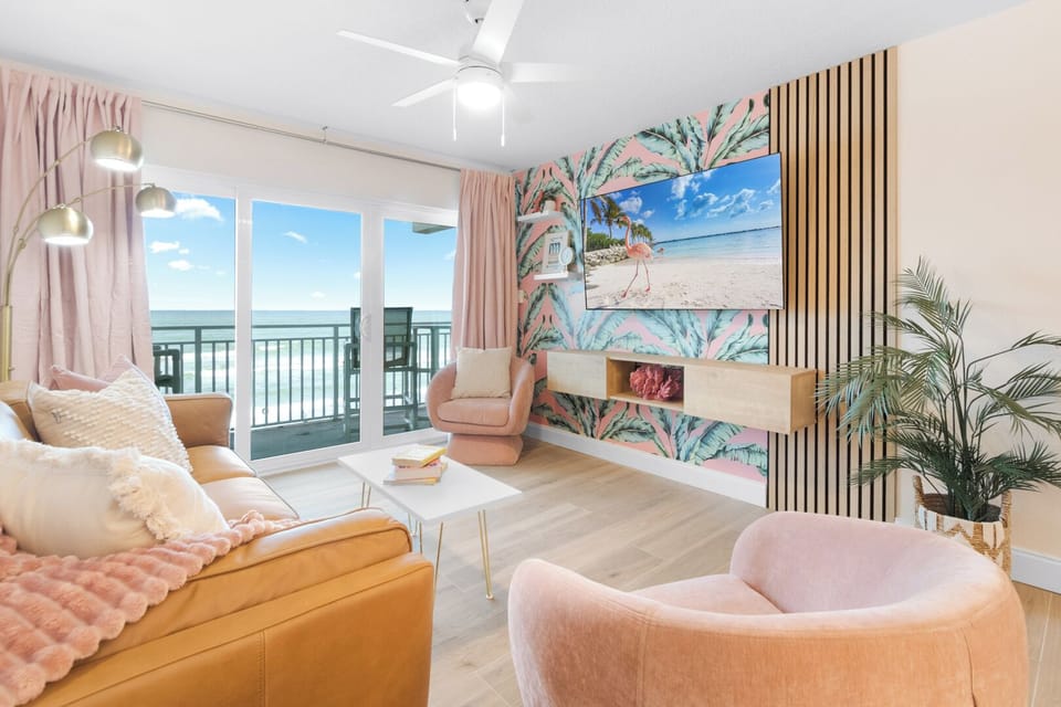 Relax in this airy ocean view living space where the waves are just a glance away