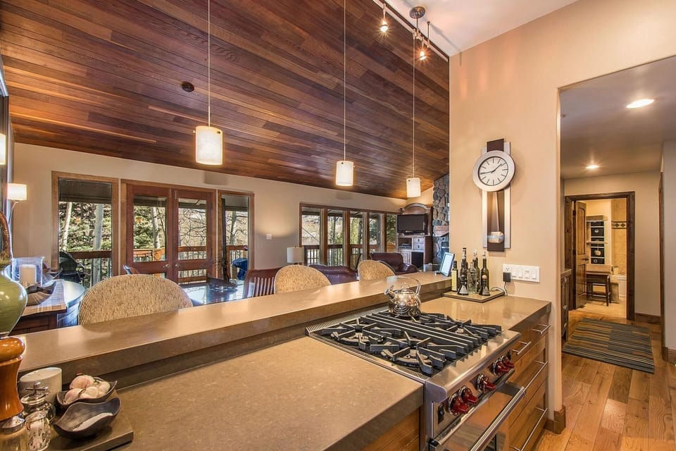 Let your inner chef out in this Fully Equipped Kitchen Complete with a High End Viking Gas Range, Wood Floor and Breakfast