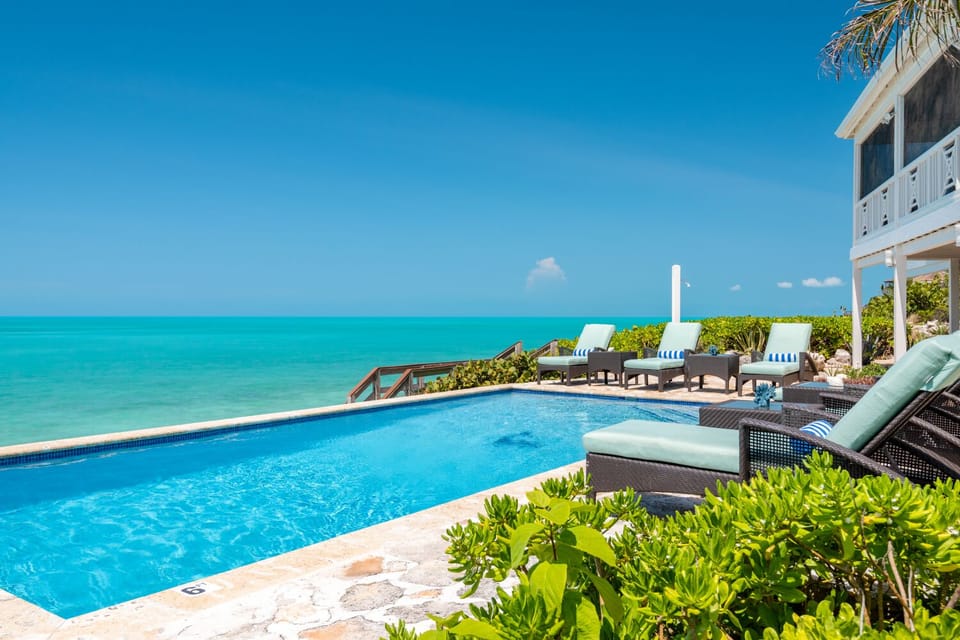 Located directly on the crystal blue waters of the ocean