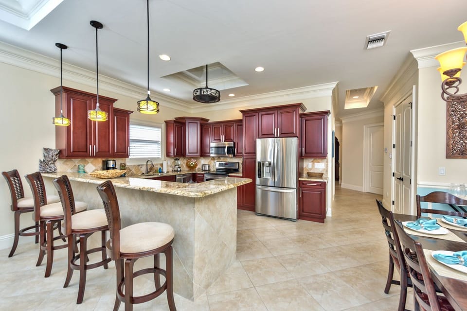 Fully Stocked Kitchen with All New Appliances; Dining and Bar Stool Seating!