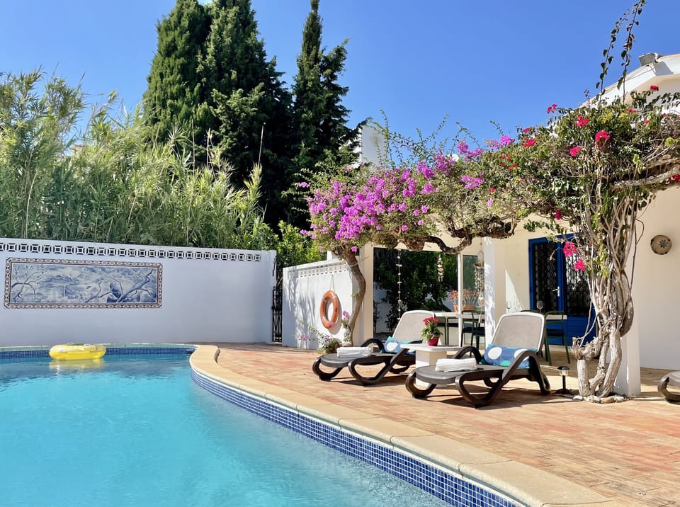Casa da Figueira's beautiful large heated pool and patios. 