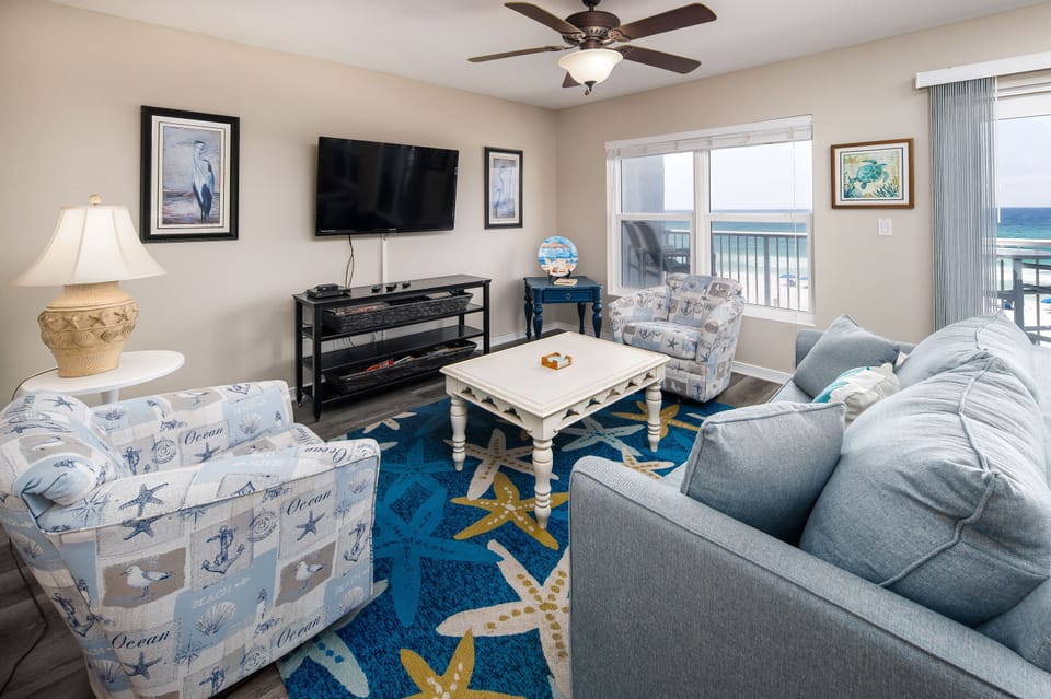 Inviting beach front living room - Large flat screen, sleeper sofa and memorable gulf views