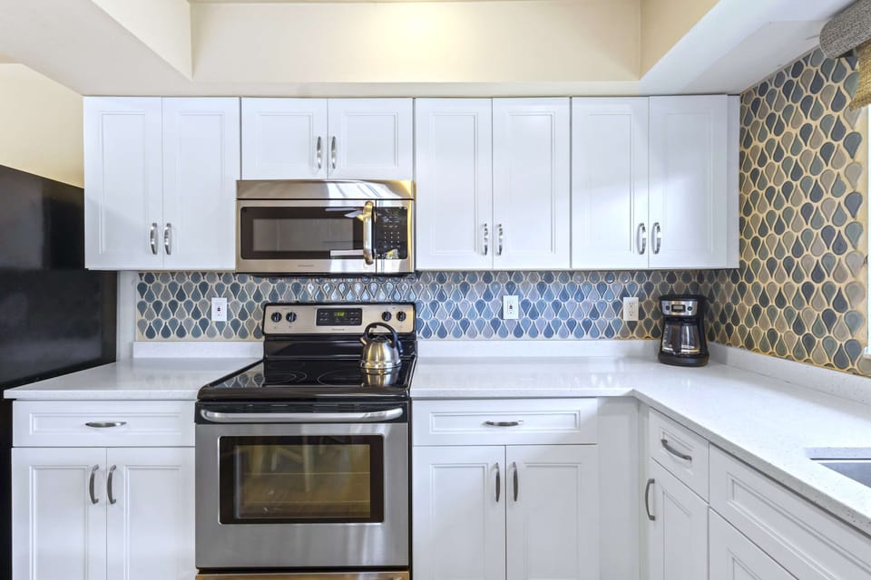 Spacious, Fully Stocked Kitchen; Newly Furnished!