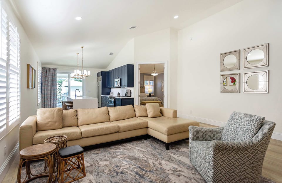 Spacious living room with comfortable sofas and a flat-screen TV