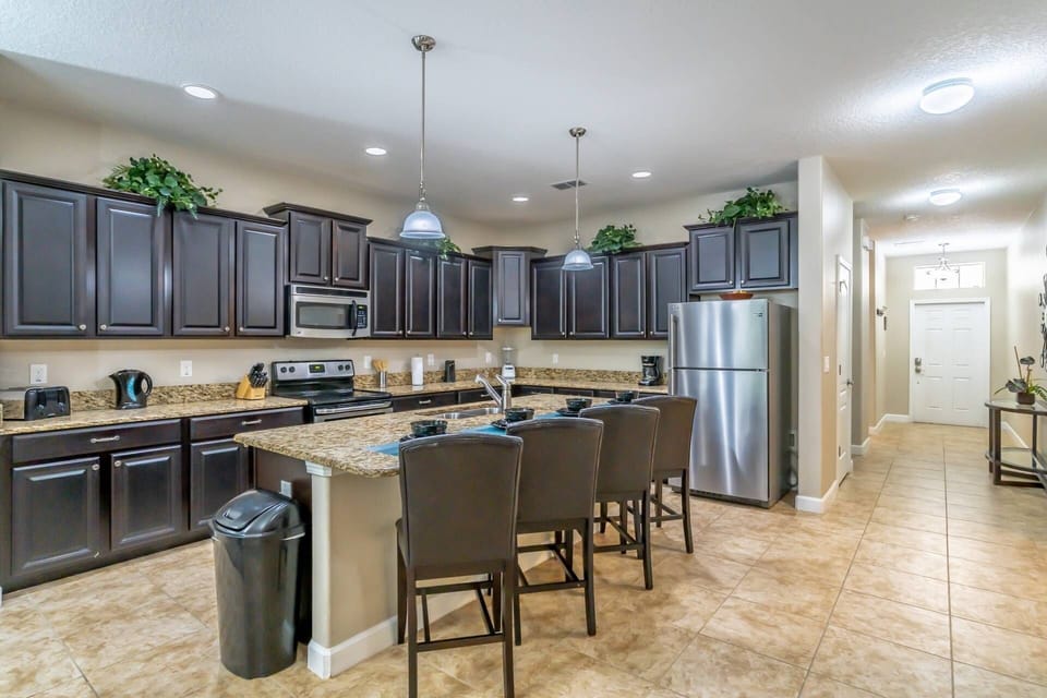 Modern Kitchen - Tile Flooring, Stainless Steel Appliances & Granite Counter Tops