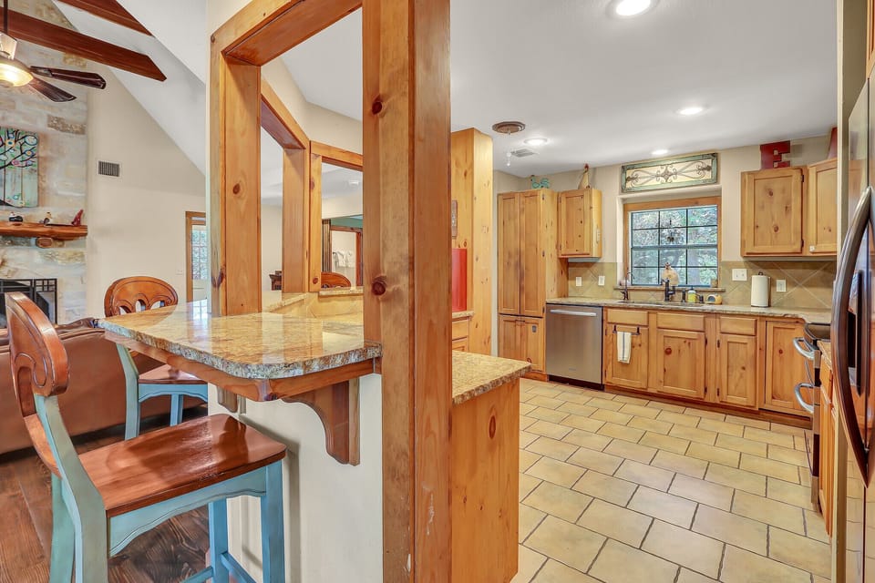 Full kitchen with stainless steel appliances
