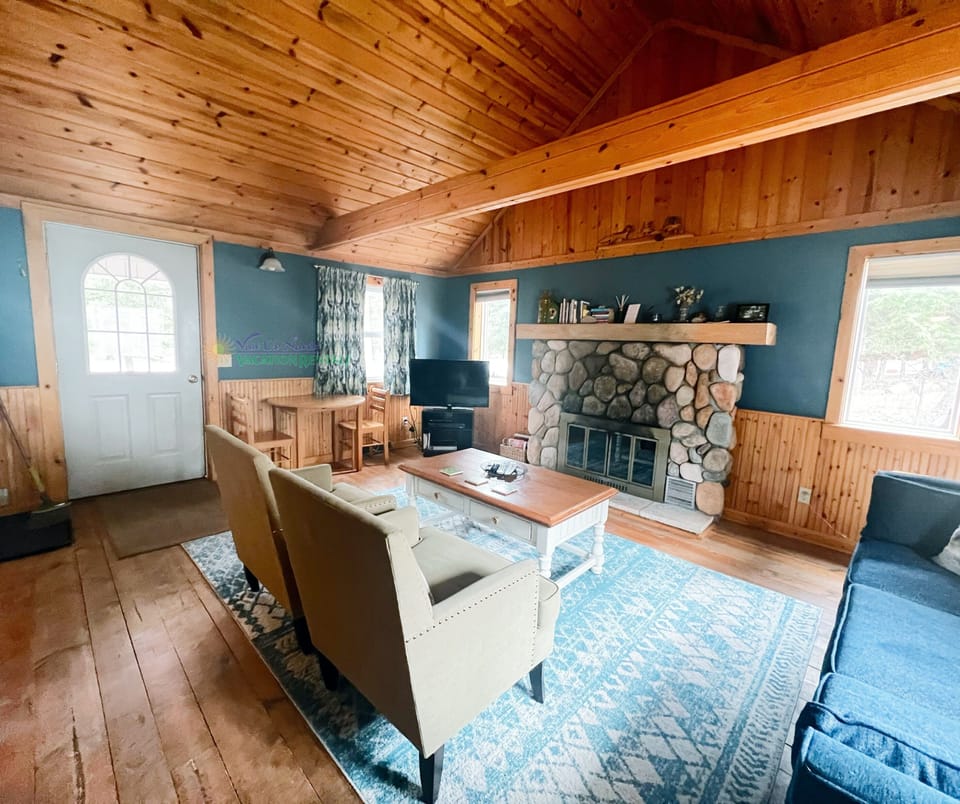 Front door into living room. - Front door into living room.