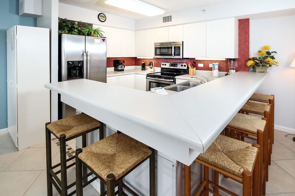 Breakfast Bar - Kitchen with  stainless steel appliances and lots of storage space.
