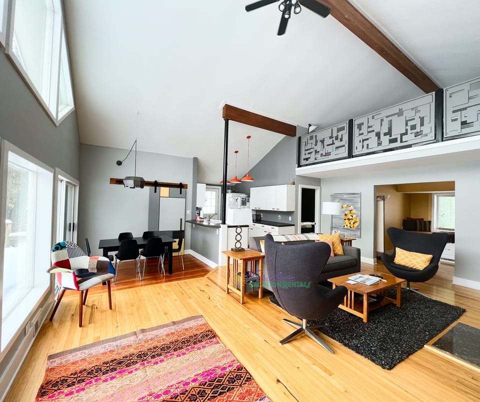 Main living area with kitchen and dining area. - WIFI, DVD player, wood-burning fireplace