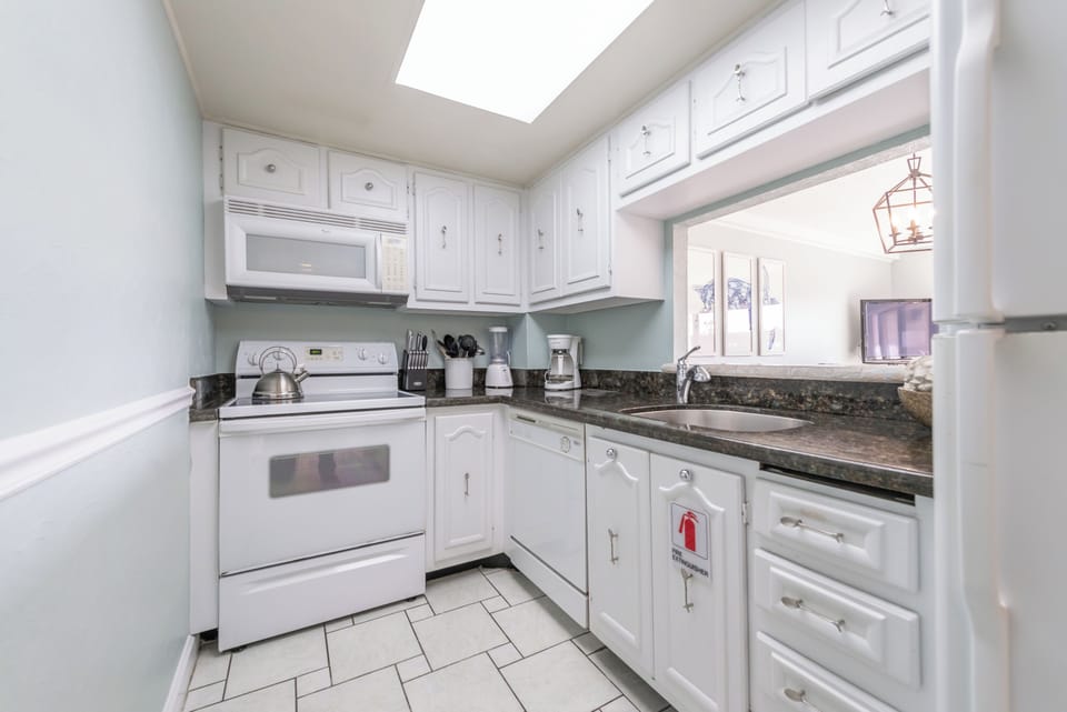 Fully equipped kitchen with modern appliances and plenty of counter space.