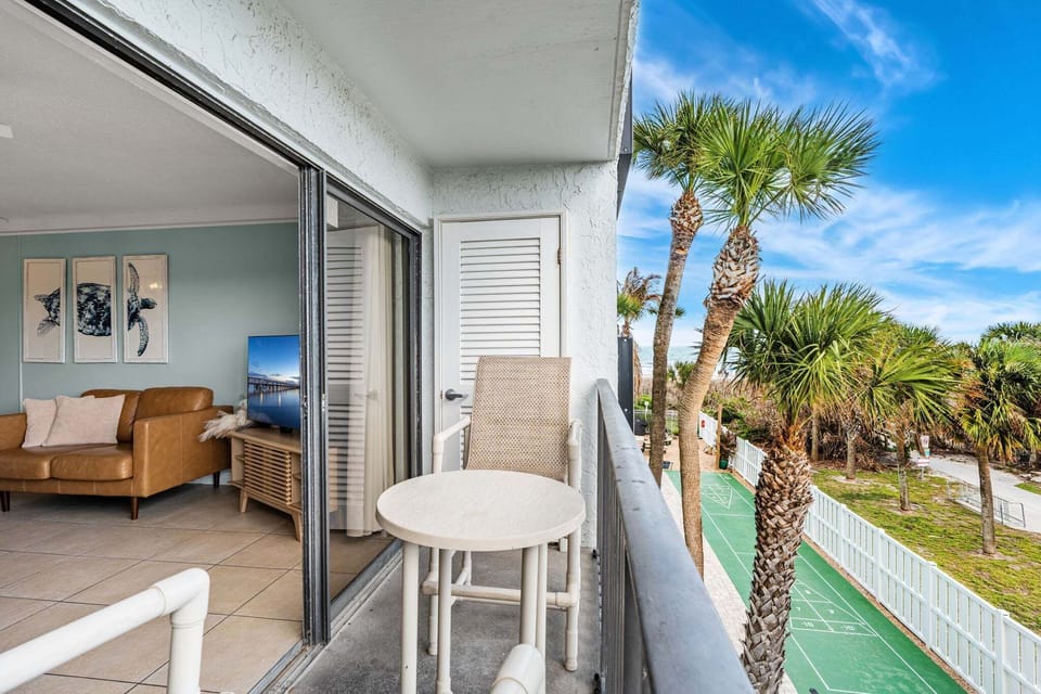 Cozy private balcony, perfect for morning coffee with a view.