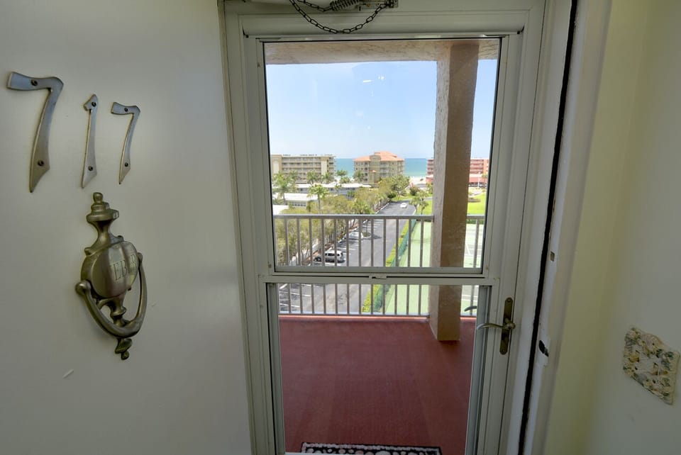 Entrance to your vacation - This vacation condo offers both views!  Directly facing the Intracoastal Waterway with a west view to the Gulf of Mexico!