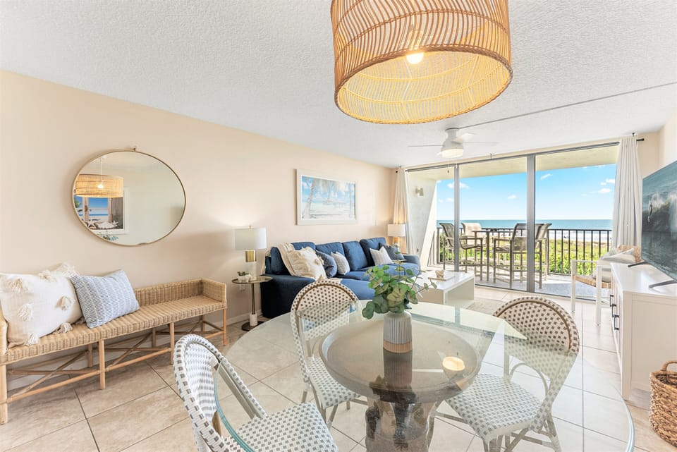 Always get that perfect view of the ocean from this beautifully designed dining and living space.