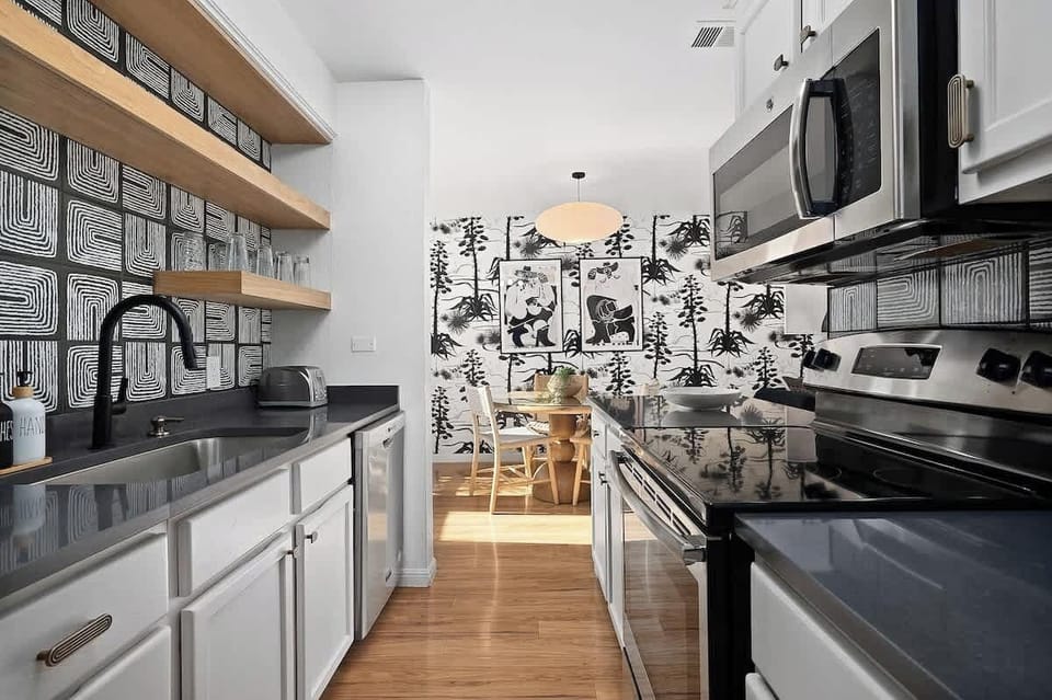 Unit A-  gourmet kitchen with stainless steel appliances