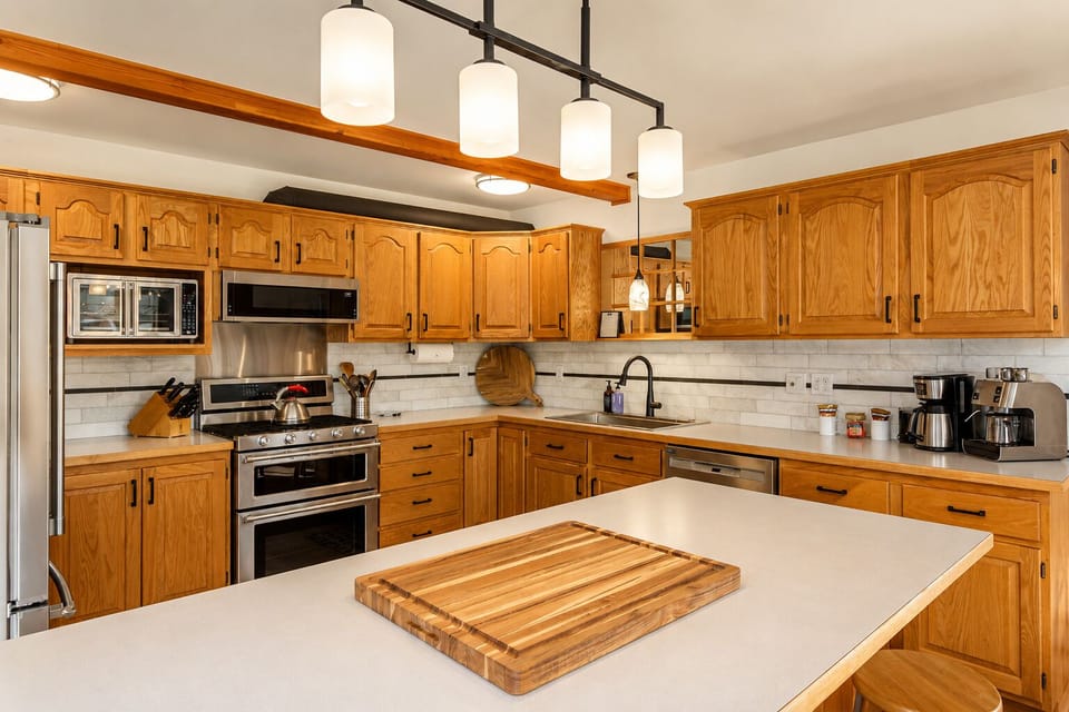 Full Kitchen includes gas range, large island with stools and everything you need to prepare home cooked meals for the group (1)