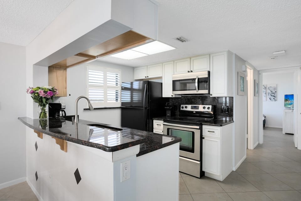 Whip up delicious meals in this sunny, modern kitchen—perfect for laughter-filled dinners and cozy nights in!