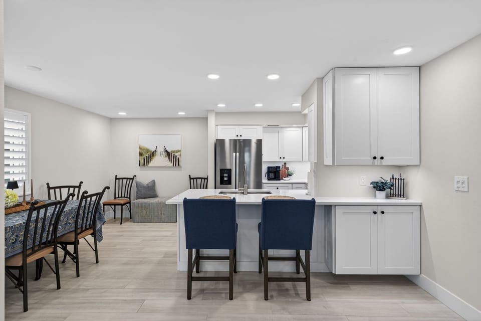 Open concept kitchen with small breakfast bar