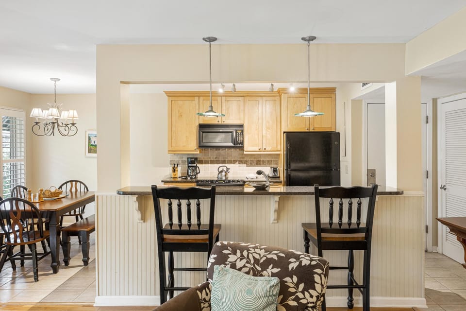 View of kitchen from living area