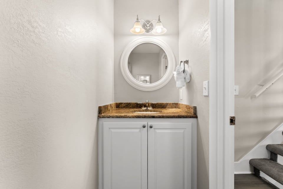 The half bathroom is conveniently located in the main living area