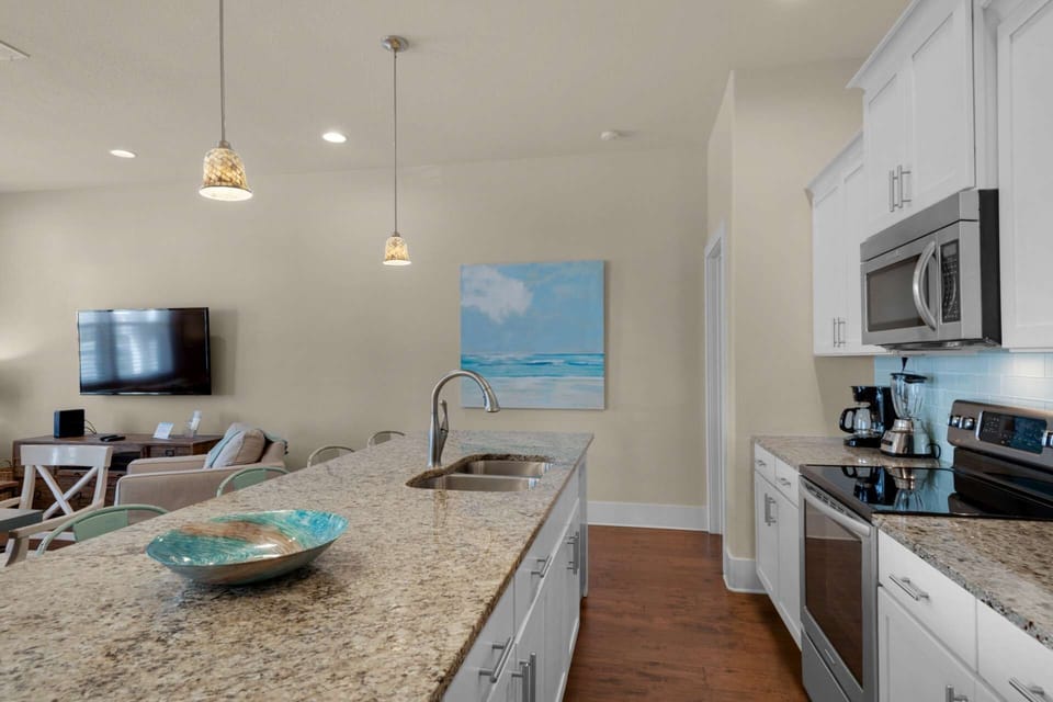 Large kitchen with stainless steel appliances