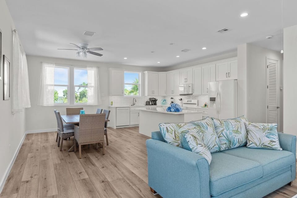 Open concept living, dining, and kitchen area