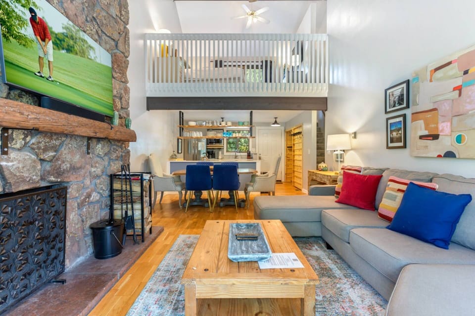 Two Story Living Room with views of the open Loft.