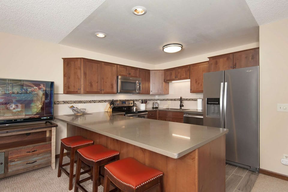 Chat with the cook or chop - comfy bar stools make it a joy
