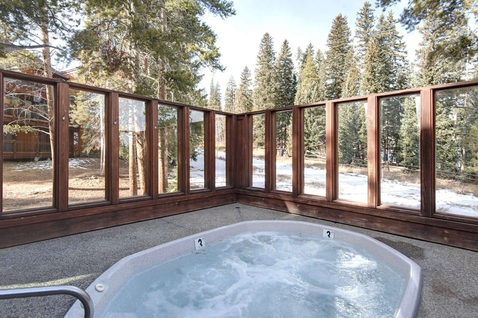 Outdoor Spa connected to the Communal Indoor Pool/Spa at the Building - Watch skiiers!