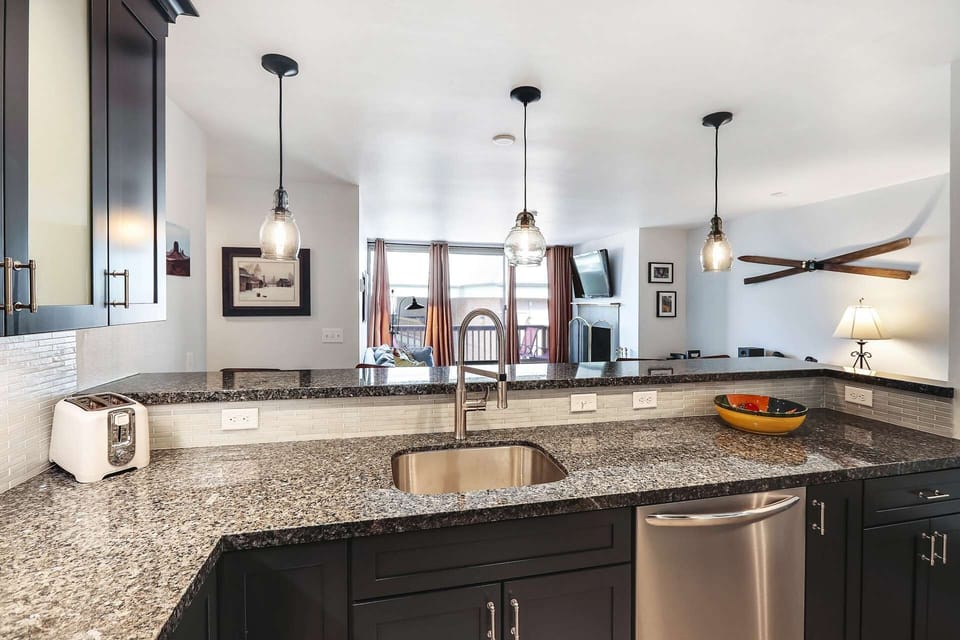 Open Floor Plan w Breakfast Bar Overlooking Family Room, Upgraded Appliances, Hardwood Floors, Granite Countertops, Stainless Steel Appliances