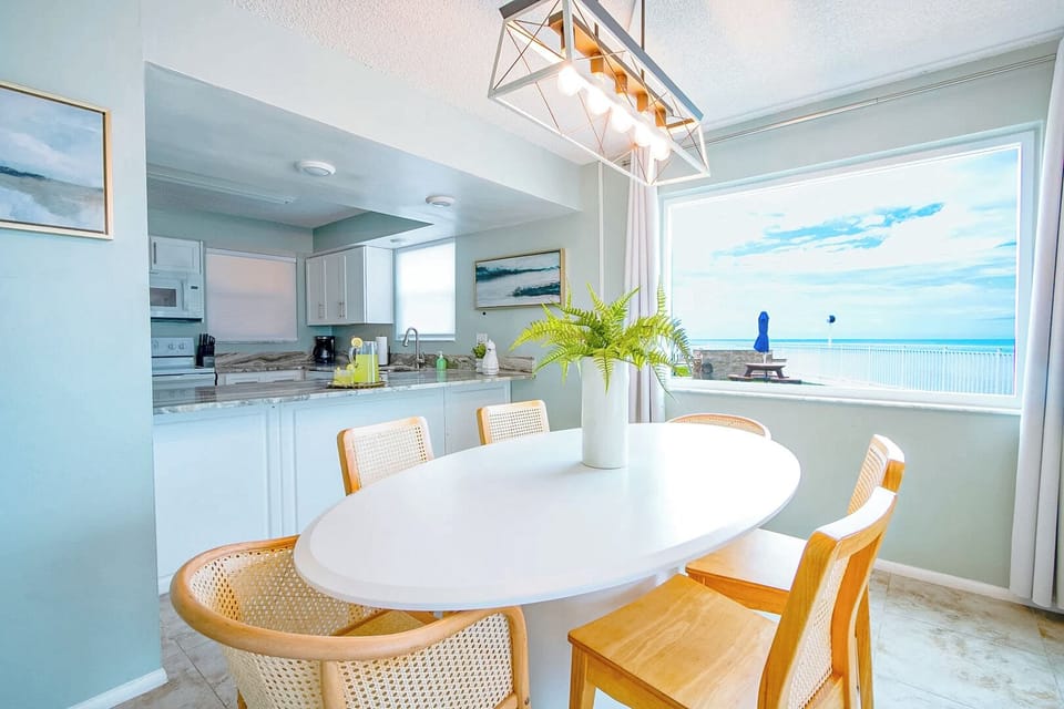 Gather around this stylish dining space that seats six