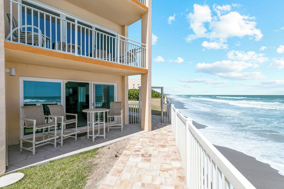 Step onto your private patio located directly on the beach