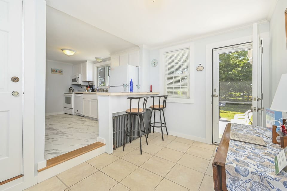 Side entry into the Newly remodeled Kitchen with eat at counter- 54 Hiawatha Road Harwich Port Cape Cod New England Vacation Rentals