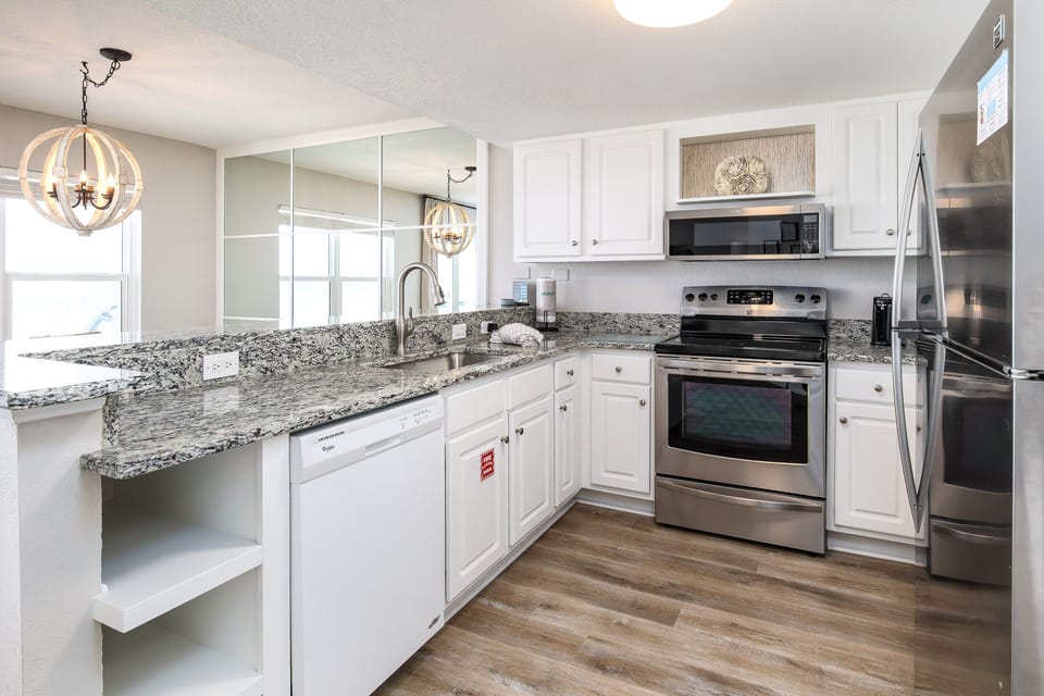 Kitchen - Stainless steel appliances with lots of cabinet & counter space