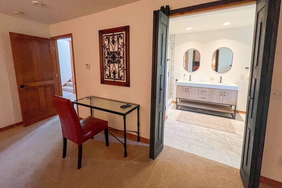 The Primary Bedroom features a newly renovated en suite.