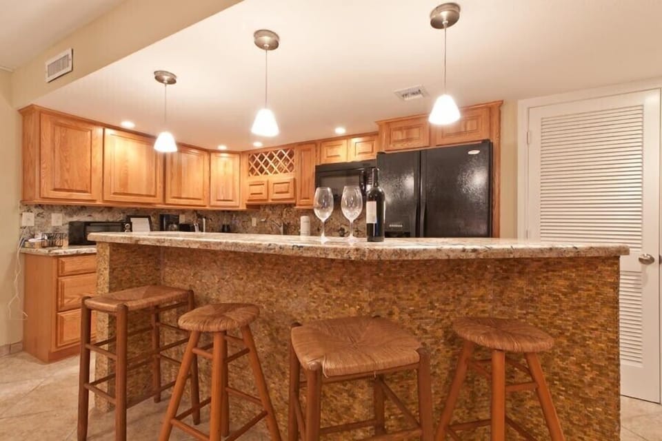 Our breakfast bar features seating for four. 